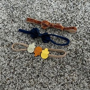 Three baby headbands
